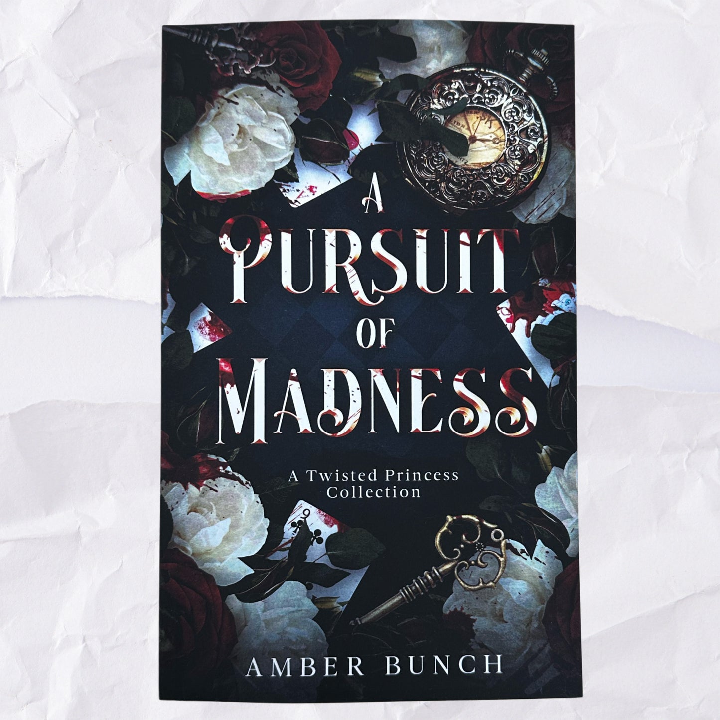 A Pursuit of Madness (A Twisted Princess Collection #1) by Amber Bunch