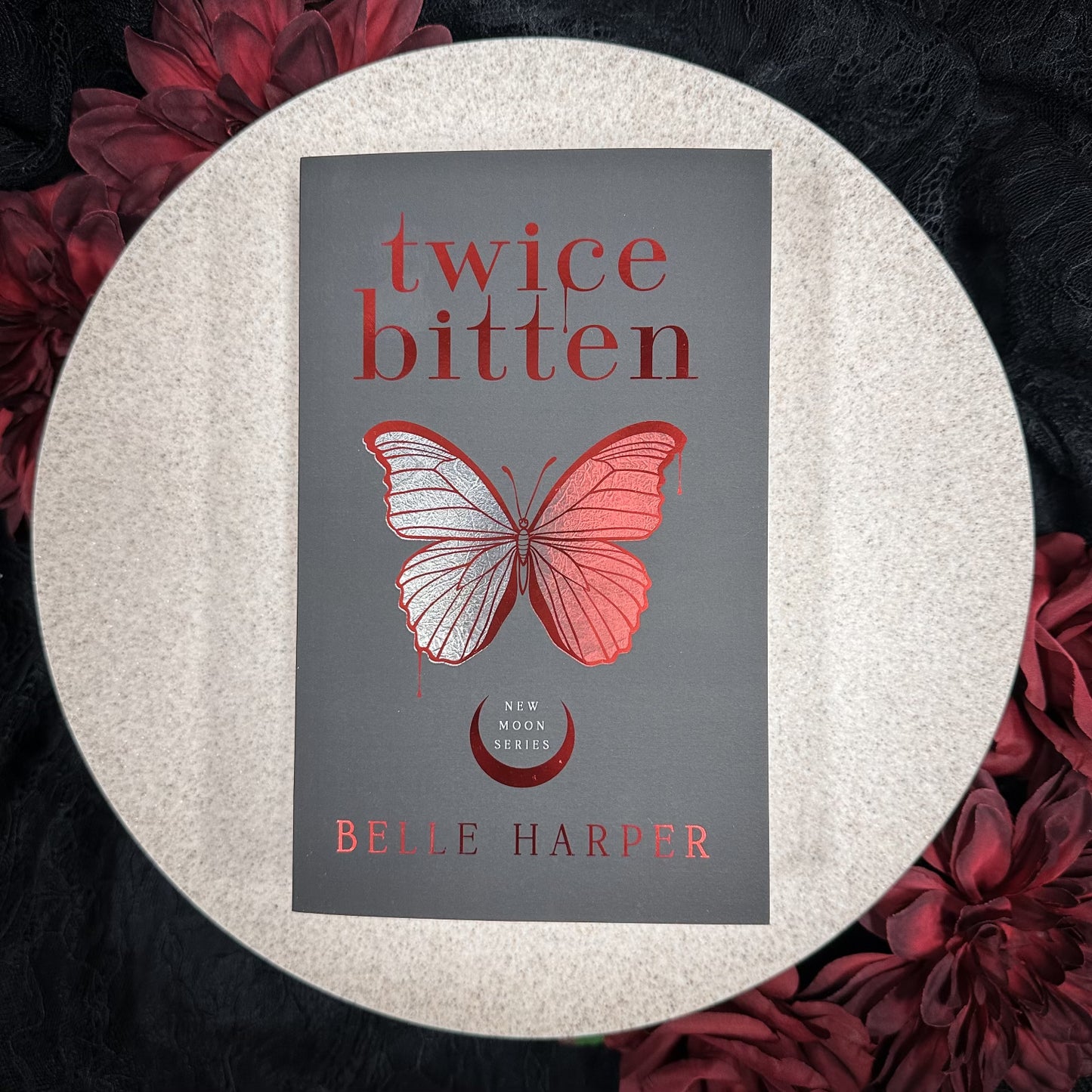 Twice Bitten (New Moon #1) by Belle Harper - Foiled Edition