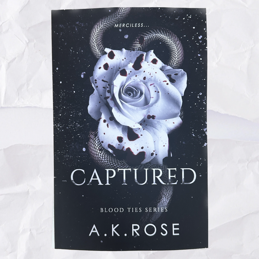 Captured (Blood Ties #8) by A.K. Rose